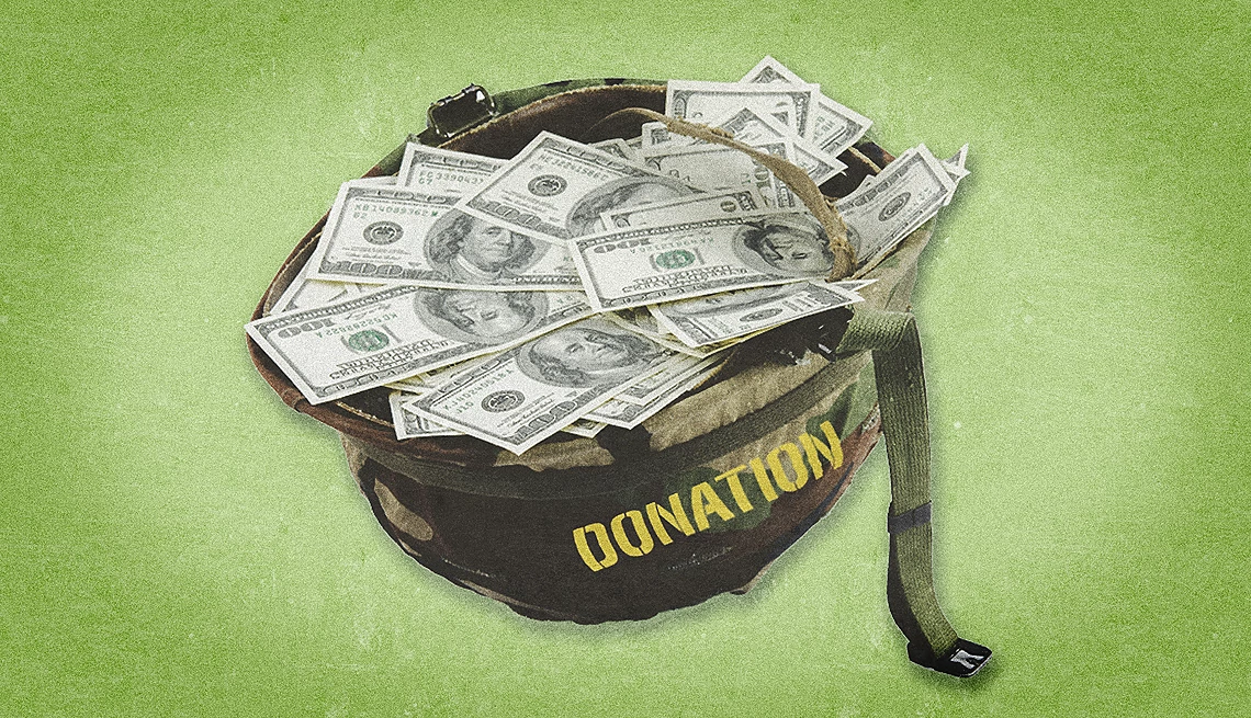 how to identify veterans charity scams a military helmet with cash inside of it