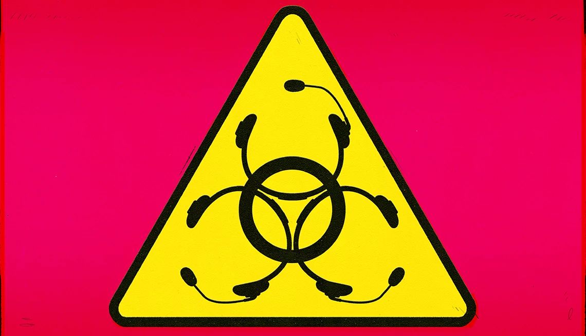 Tech Support Scams a yellow warning sign with headsets forming a black circle