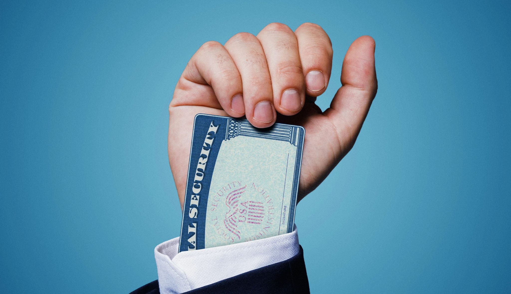 how to spot social security scam calls a social security card tucked up a person's sleeve